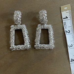 Silver tone earrings